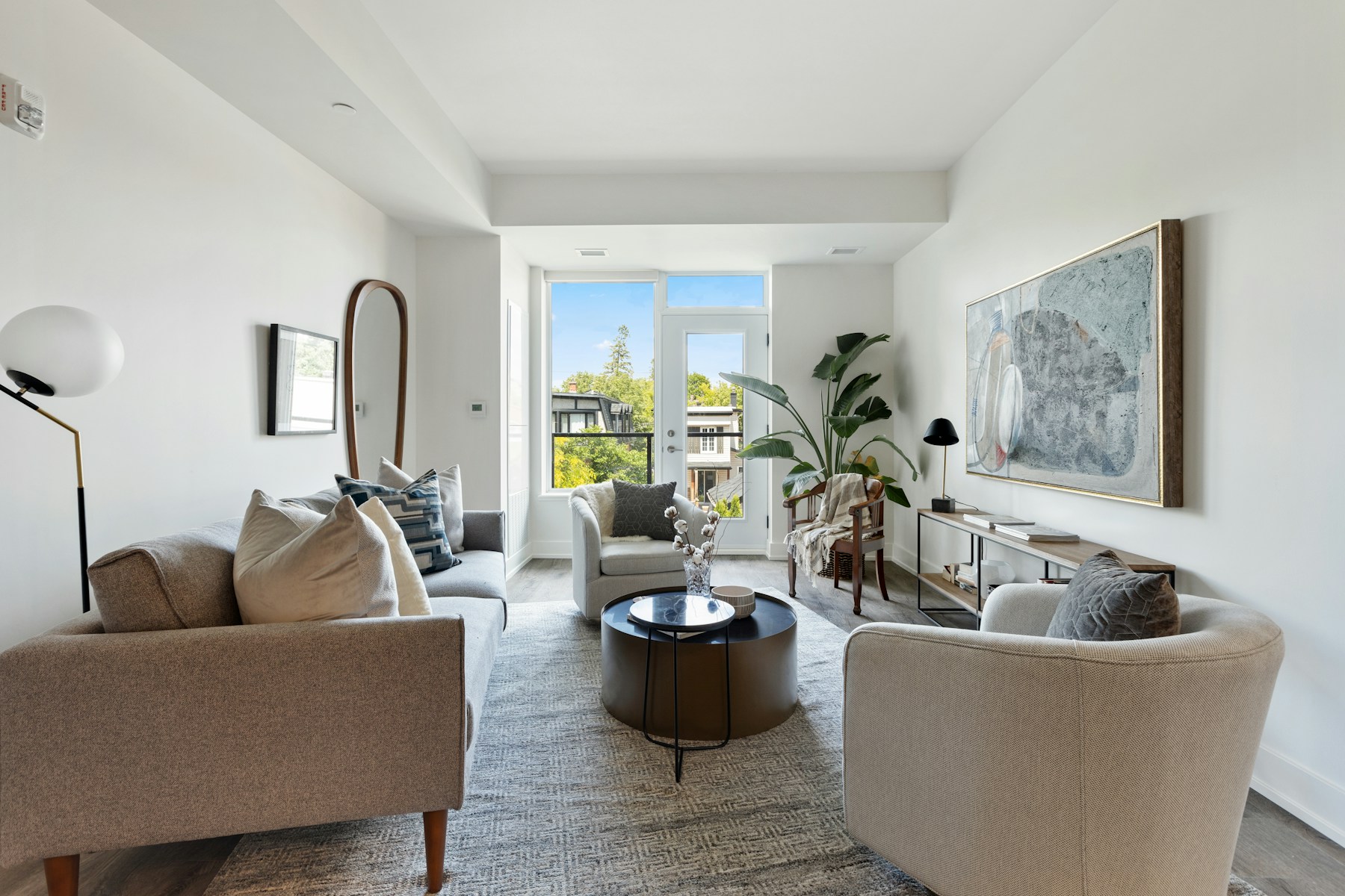 A bright, carefully maintained modern living room